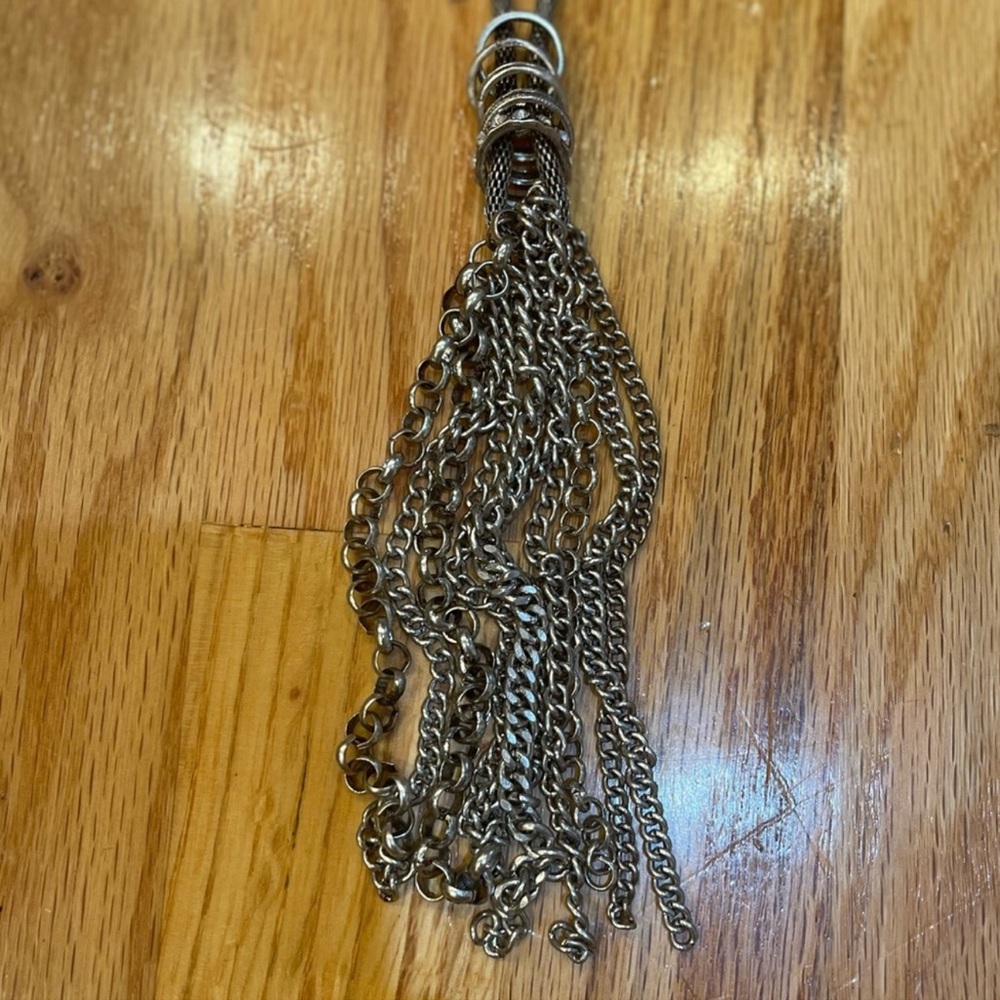 Long silver toned chain tasseled necklace